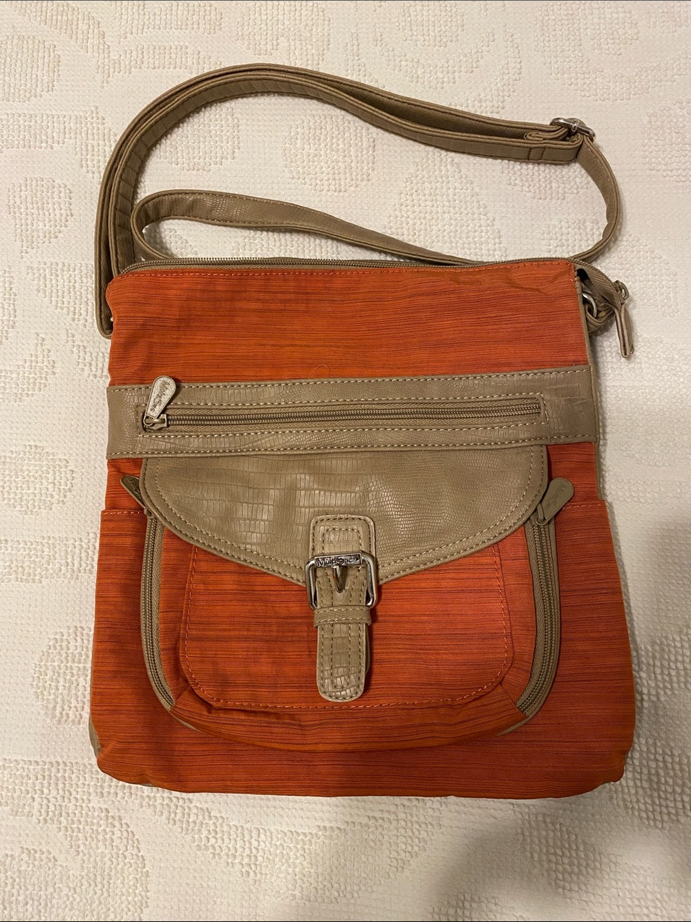Multi-Sac crossbody in pumpkin color. Lots of pockets.